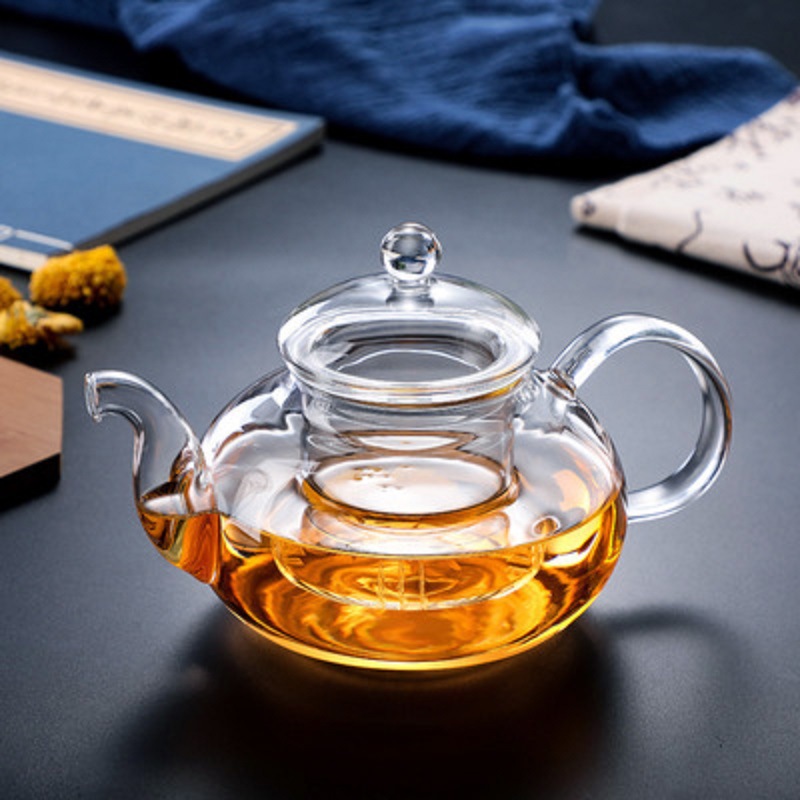 Fábrica al por mayor engrosada vidrio borosilicato flor tetera traje de alta temperatura resistente vidrio tetera filtro Kung Fu juego de té