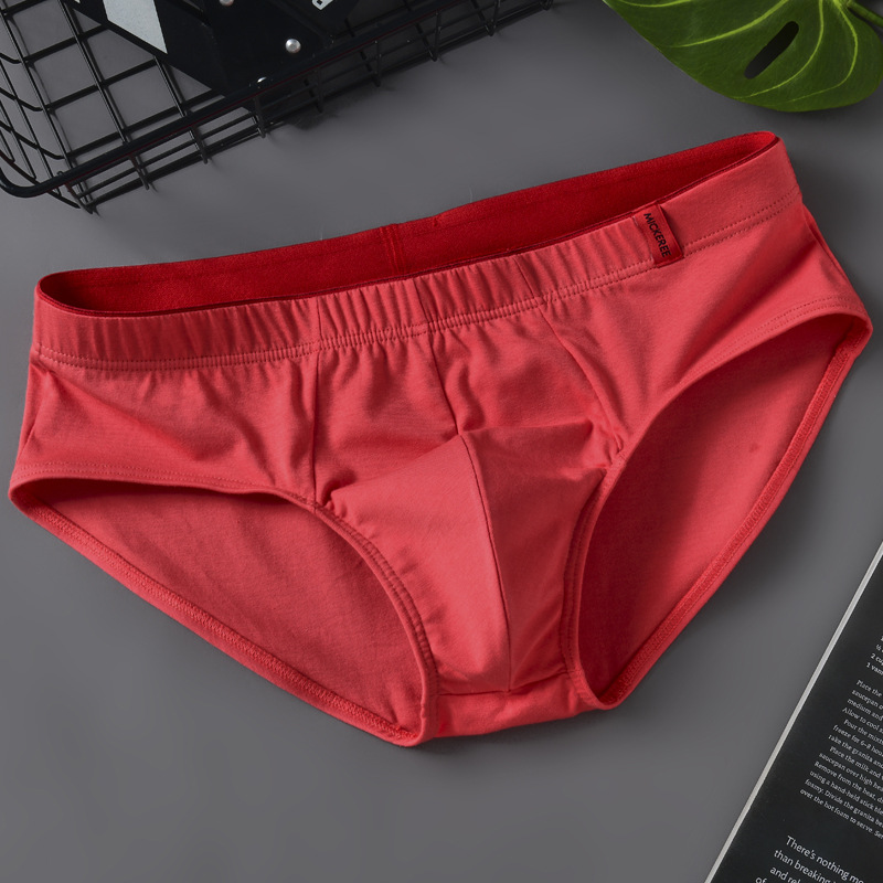 Wholesale direct selling solid color cotton triangle men's triangle low waist explosions trend breathable men's underwear triangle a generation of hair