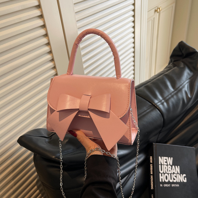 Bolso de mujer 2025 tendencia de verano nueva moda dulce arco de hombro bolso de mano bolso de mano