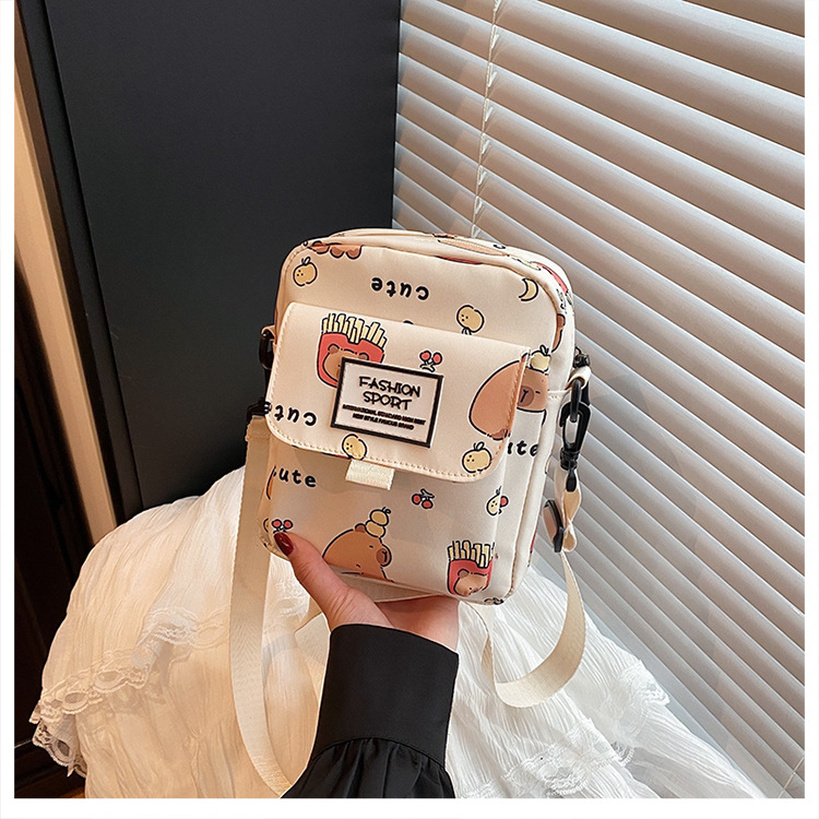 Cartoon animal print, many pockets, few bags, single-shoulder bag for girls, large capacity, cute graffiti, lightweight schoolbag for primary and middle school students undefined