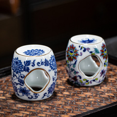 Antique blue and white porcelain tea set lid placed on an imitation ancient ceramic pot stand, white porcelain tea set accessory for tea ceremony, tea toy and decorative piece