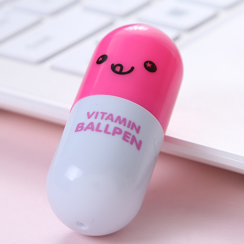 Nuevo mini cara sonriente emoji píldora bolígrafo plástico retráctil creativo rompecabezas estudiante papelería regalo al por mayor