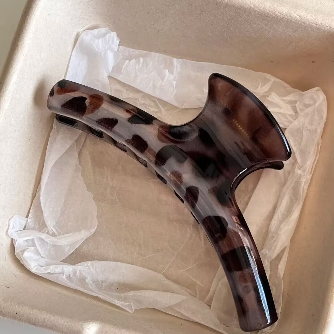 Gray leopard print clothes hanger