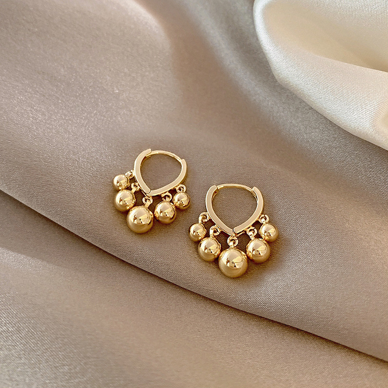 Pendientes de borla de metal de moda europea y americana, pendientes geométricos simples de estilo frío transfronterizo