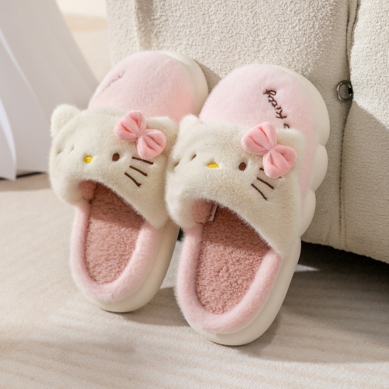 Una pieza de entrega al por mayor Sanrio coolomi ojo grande Rana melodía Hello Kitty Zapatillas de algodón para niños padre-niño invierno