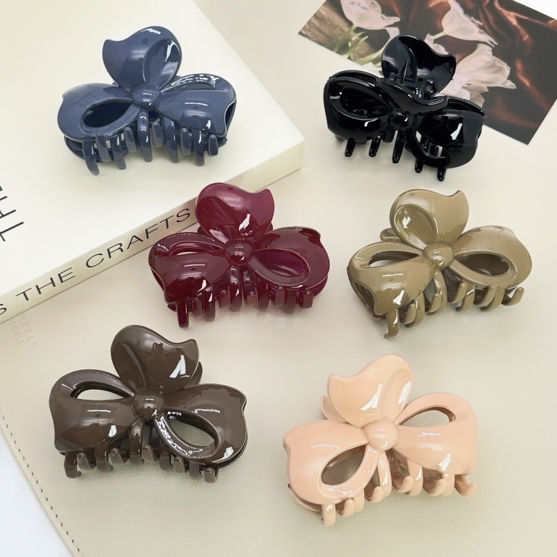 Pearl twist hair clip with plastic embellishment women's Korean side clip Korean style individually packaged pastoral two-yuan store accessories