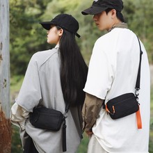 潮牌轻便休闲斜挎包秋冬新款男士运动背包通勤单肩包女户外手机包