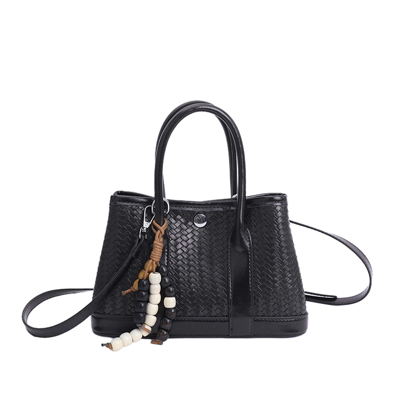 Bolsa de mano de alto nivel transfronterizo trenzada bolsa de cubo de agua para mujeres otoño y invierno 2025 nuevo estilo extranjero bolso de hombro bolso de mochila versátil