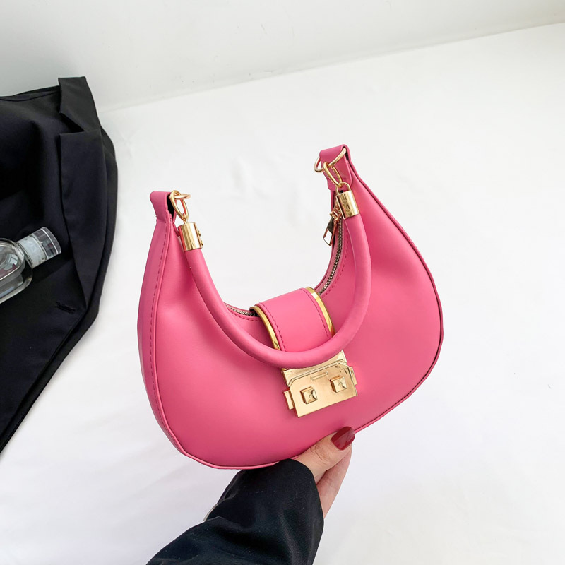 Bolso de axila simple y moderno 2024 nuevo diseño de nicho, estilo explosivo transfronterizo, bolso de luna nueva de un solo hombro de todo fósforo