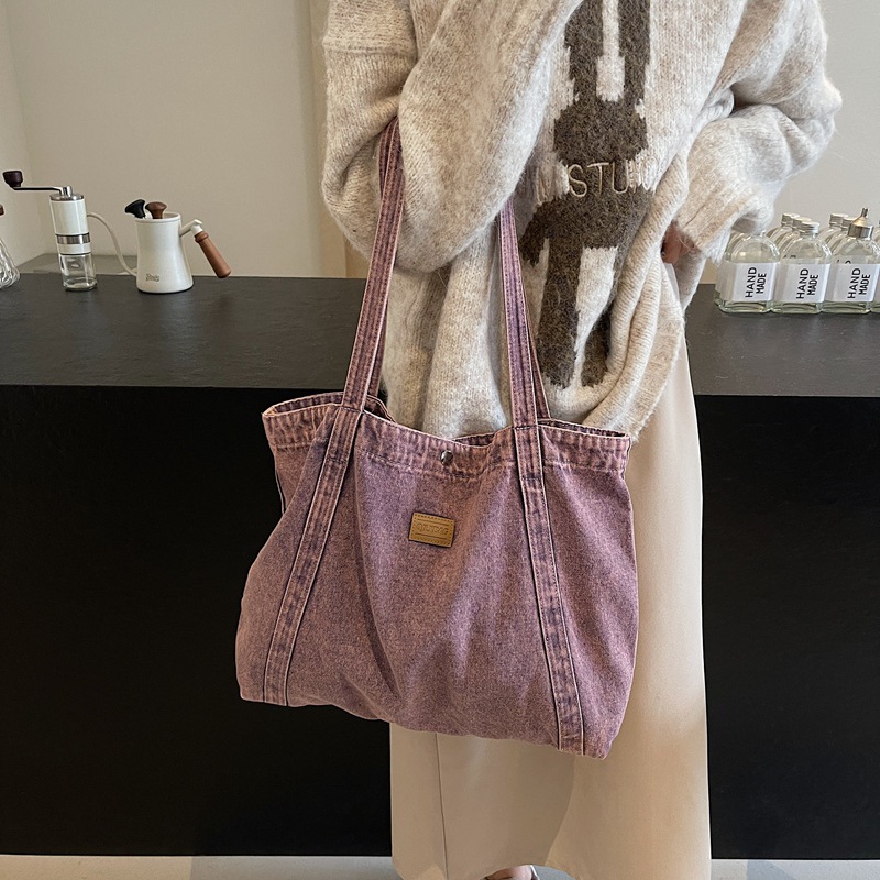 2024 nuevo bolso de hombro de mezclilla de gran capacidad bolso de compras bolso de ocio de arte de nicho al por mayor