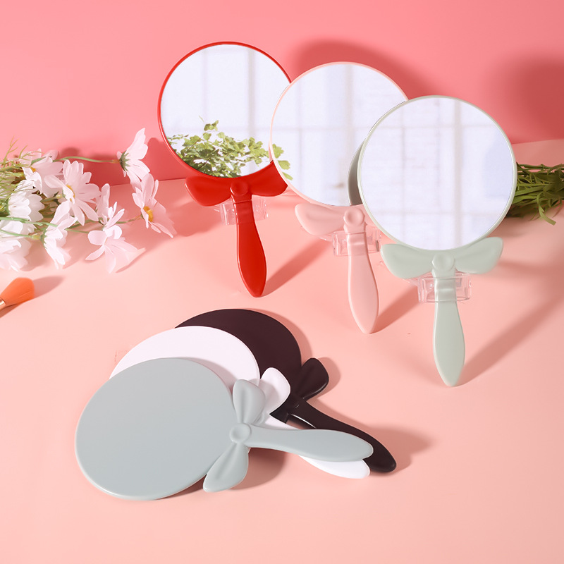 Espejo de maquillaje con mango en arco | Diseño creativo, personalizable con logo, venta al por mayor