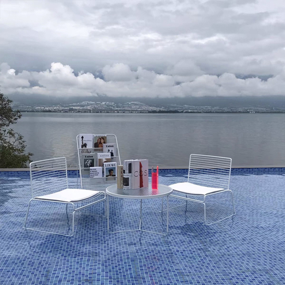 Nordic minimalist outdoor furniture set for tea shop, caf&eacute;, balcony, open-air courtyard, garden, including tables and chairs made of iron.