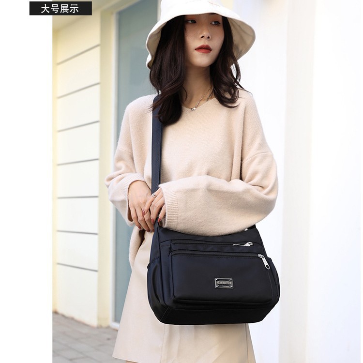 가방 크로스백 여성 대용량 핫 세일즈 여성 가방 패션 심플 캐주얼 숄더 가방 나일론 멀티 레이어 엄마 가방