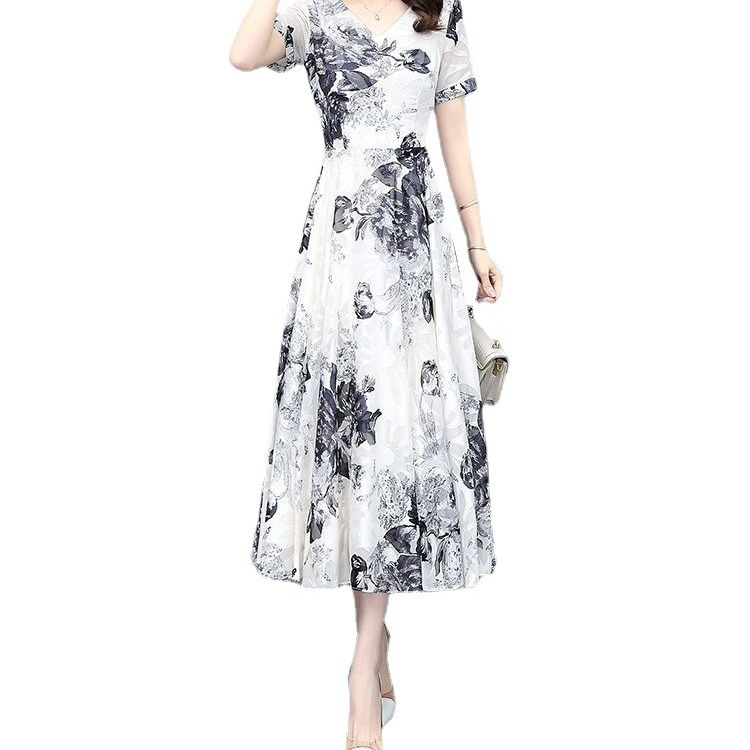 2023夏の新型中年婦人服の大きいサイズの気質はやせて腰を収めて年齢を減らします。