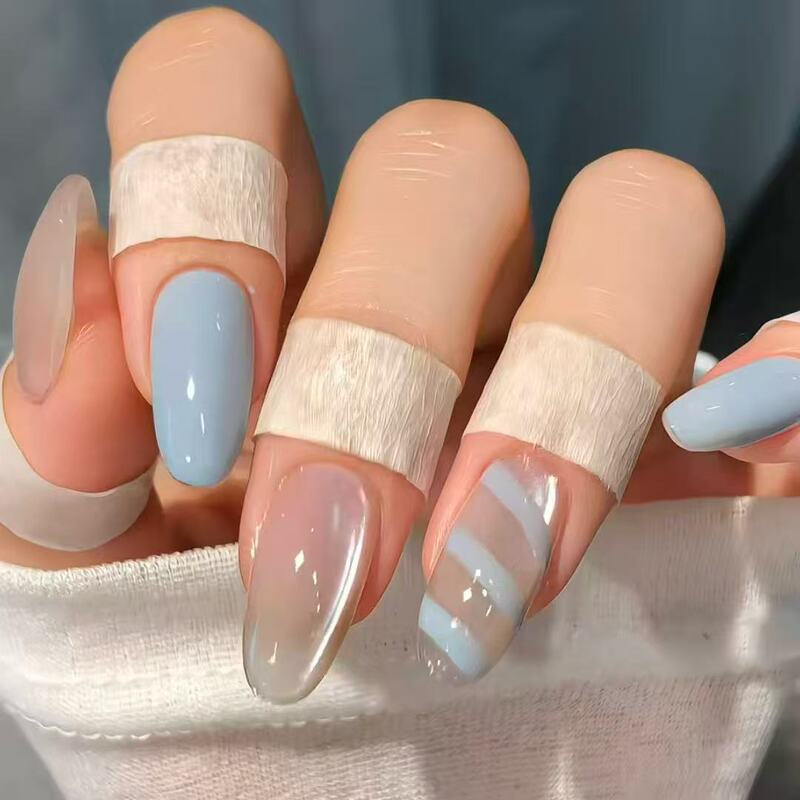 Icy blue striped press-on nails with cat-eye effect, high-end ins influencer style, elegant and flattering for students, fake nail patches Icy blue striped press-on nails with cat-eye effect, high-end ins influencer style, elegant and flattering for students, fake nail patches