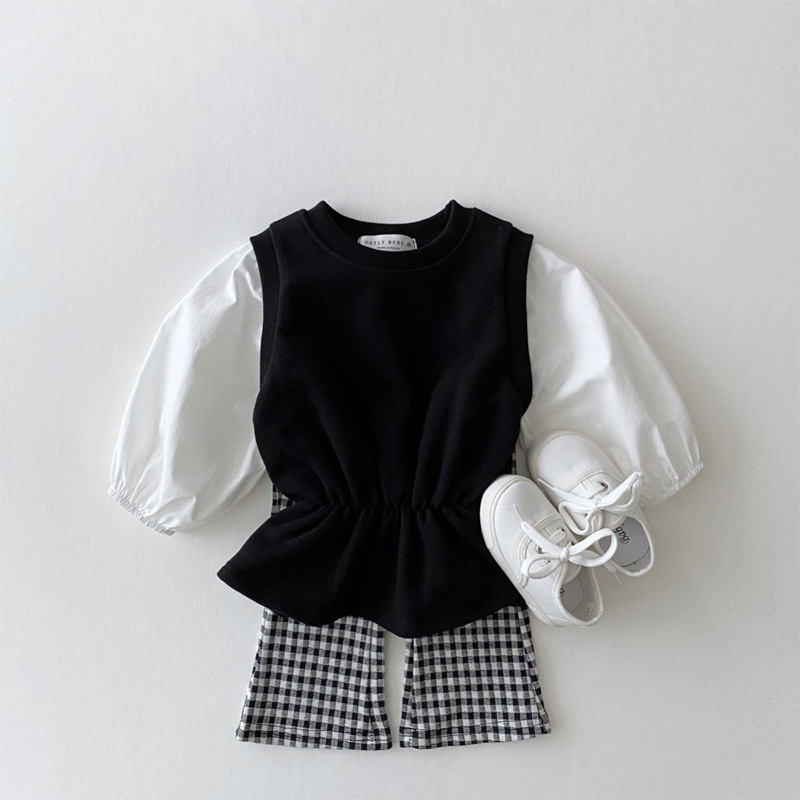 ロイ熊童ズボン春秋の新型子供服の女の子の格子のラッパのズボンの中の大きい子供の洋気のカジュアルなズボンのズボン