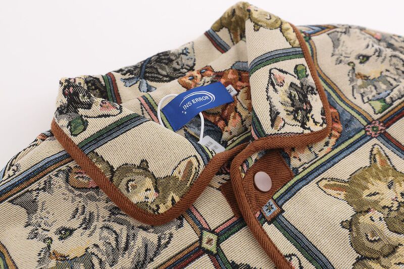 ファッションブランドのレトロな趣味の猫のジャカードの襟のジャケットの男性の秋の古着のデザイン感のゆったりした男女のコートの上着|undefined