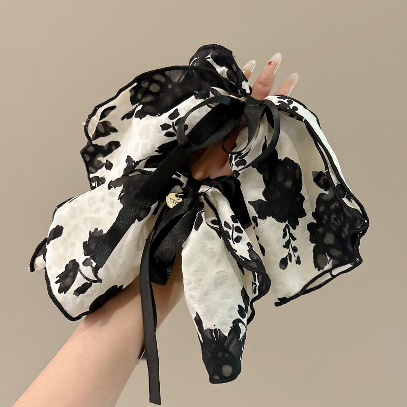 El estilo francés de alto nivel arco de cabello de la cuerda de cabello del intestino grueso temperamento de cola de caballo de verano tinta flotante cuerda de cabeza fría