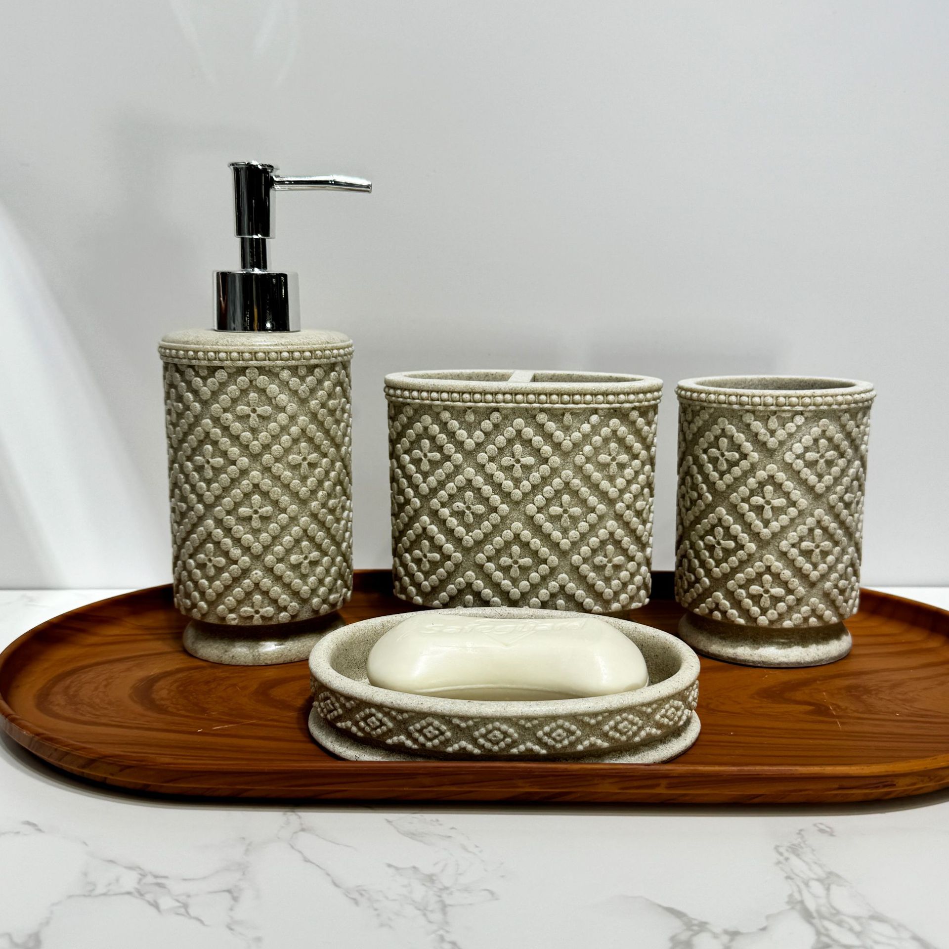 Diseño de piedra de arena imitación de resina set de enjuague de baño enjuague de baño de hotel decoración de piedra de arena set de cuatro piezas transfronterizo