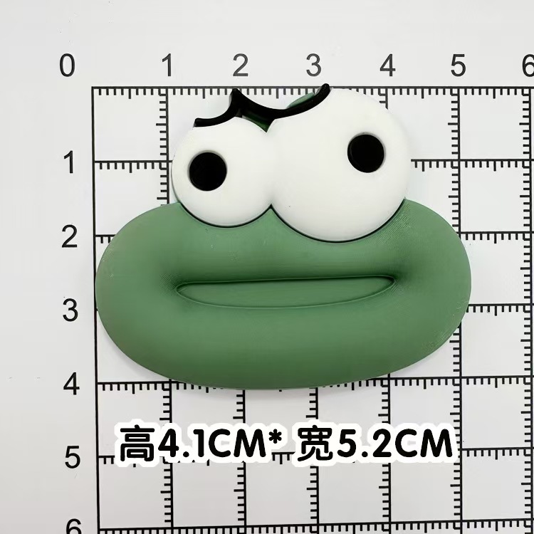 Soft glue: green funny sausage mouth