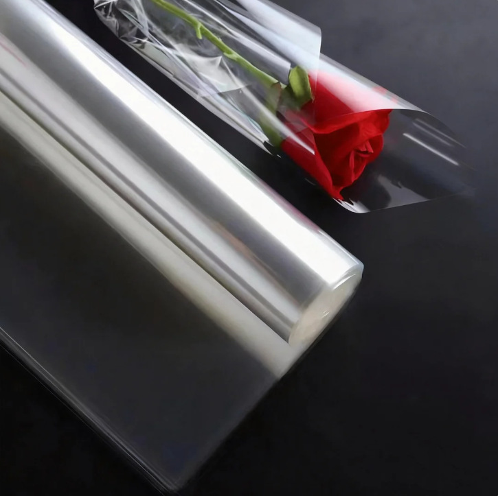 Celofán a prueba de polvo al por mayor opp forro de plástico de papel de embalaje de flores paquete de ramo celofán transparente en stock