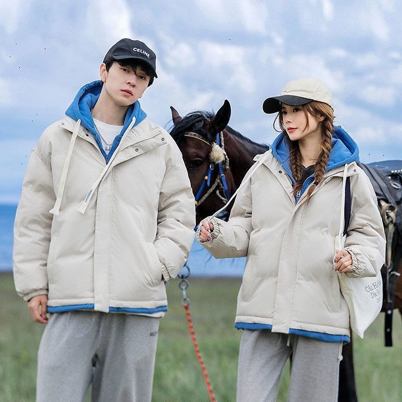 Abrigo acolchado de algodón para hombres invierno 2023 nuevo abrigo de pan con capucha de color sólido suelta pareja de moda falso Abrigo acolchado de algodón de dos piezas