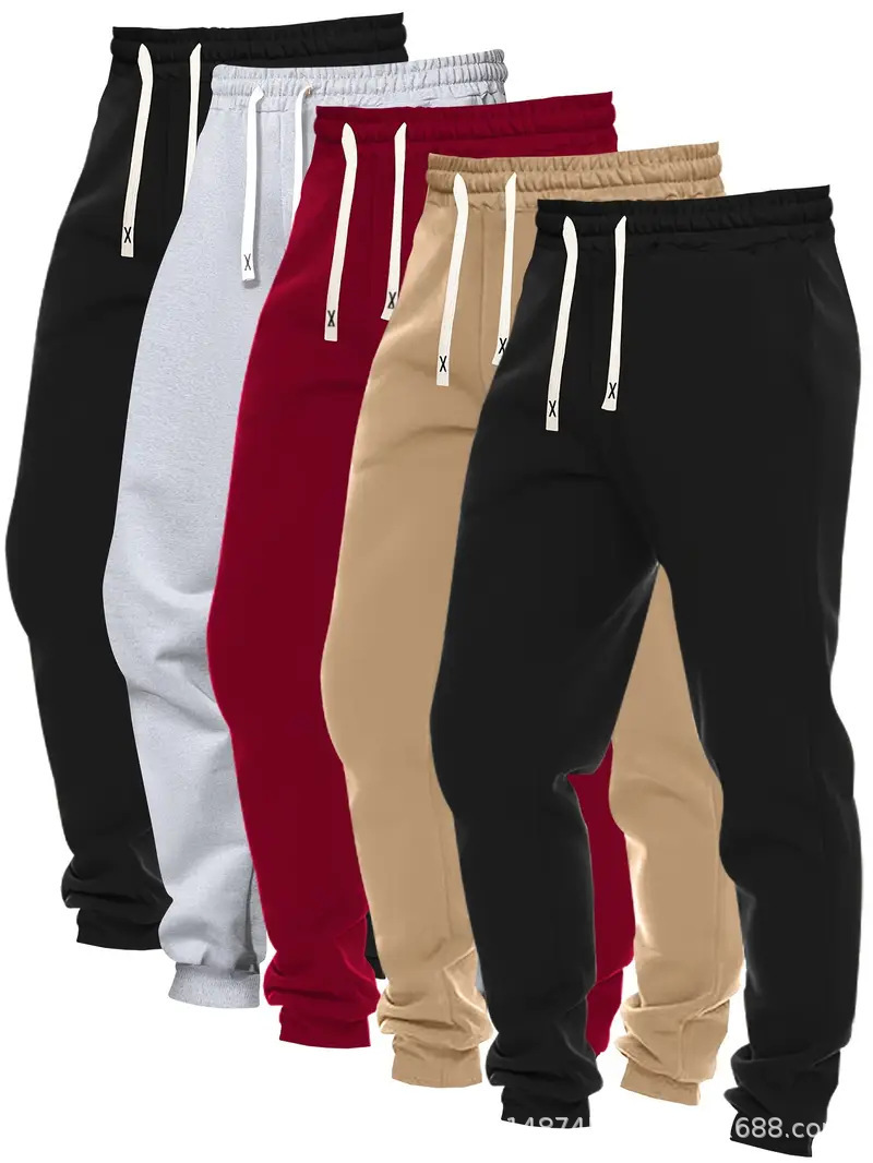 2026 explosión transfronteriza pantalones deportivos de moda masculinos de cinco piezas de color sólido cómodos ociosos pantalones de alimentación directa plataforma