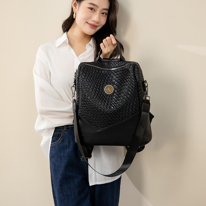 2024 nuevo tejido suave Mochila De Cuero urbano simple multiusos bolso de hombro de gran capacidad estudiante femenino al por mayor