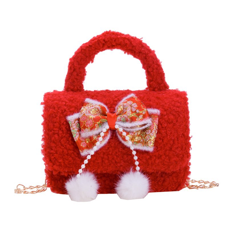 Bolsa de hombro de niña roja de Año Nuevo lindo arco borracha bolsa de bebé 2025 nueva cadena bolsa de niños