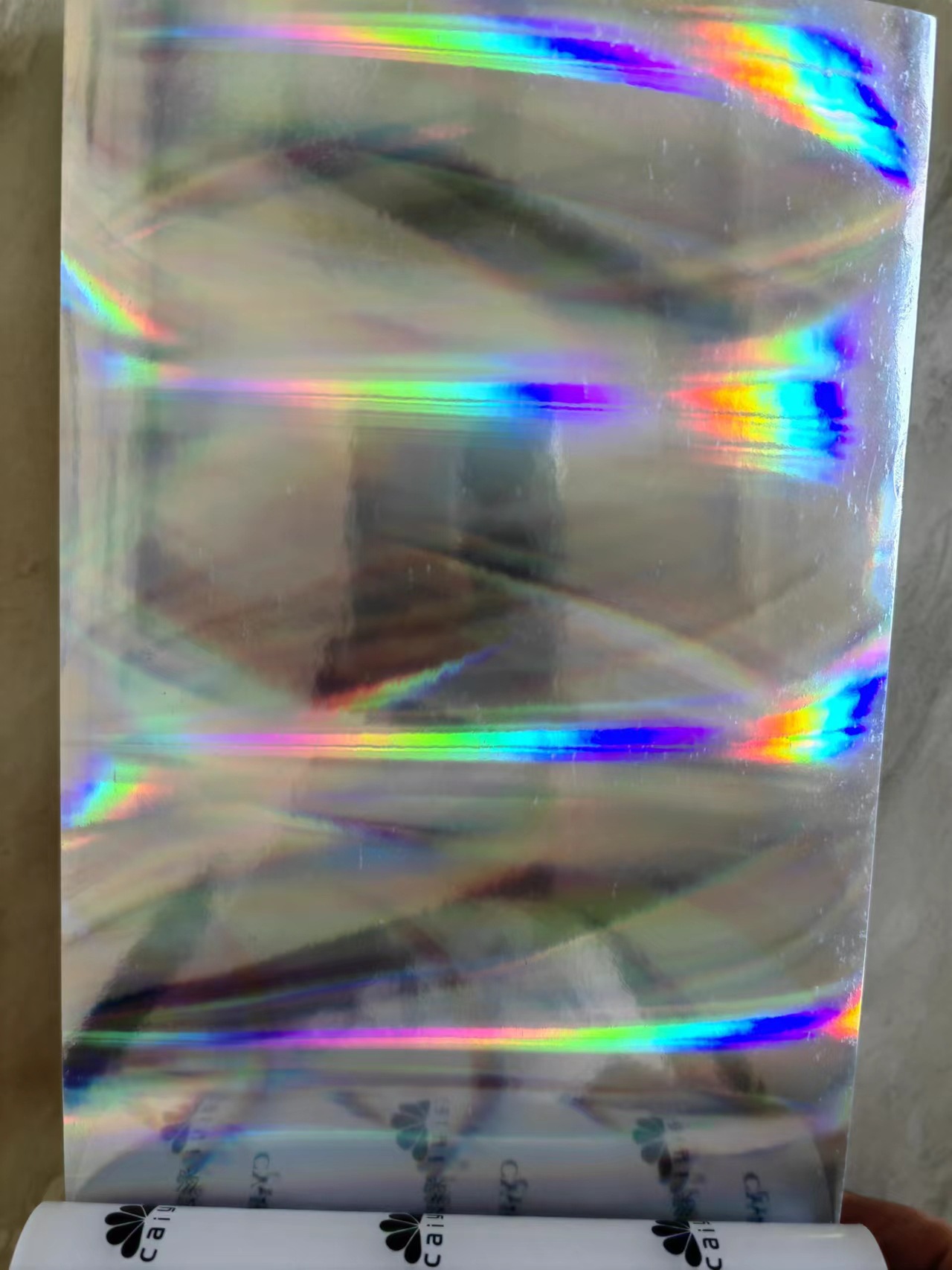 彩艺供应   直纹光柱 布沙  小猫眼  井方条等图案镭射膜