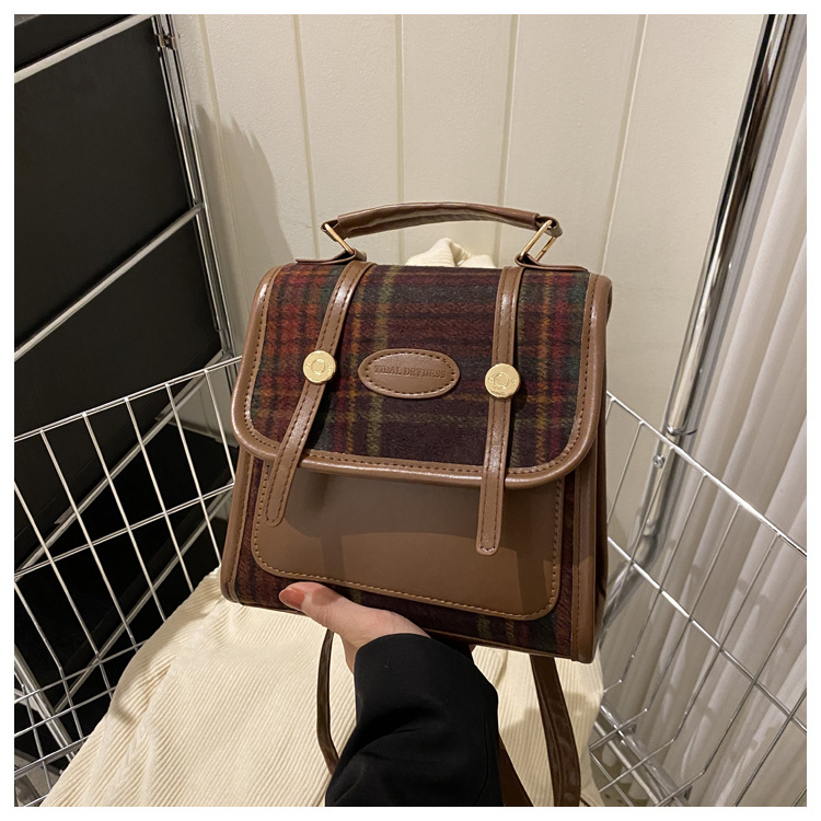 Alta textura simple color sólido estilo coreano bolso de las mujeres 2023 invierno nuevo nicho diseño hombro crossbody bolso