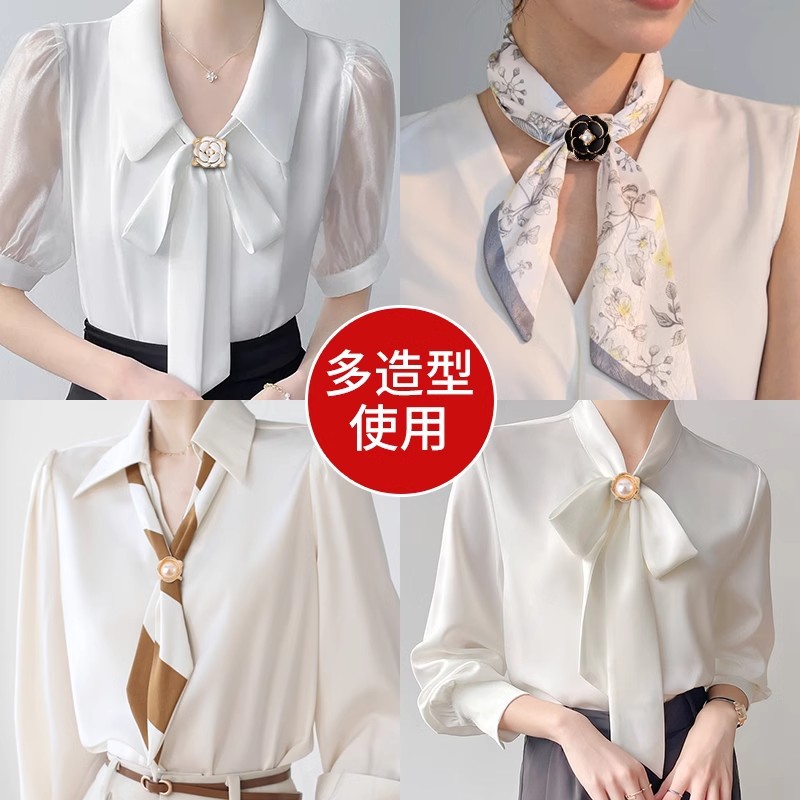 Botón de toalla de seda de alta calidad para mujer de alta gama 2025 nuevo estilo arco esquina anudada camisa de flores serpentina anudada hebilla anudada