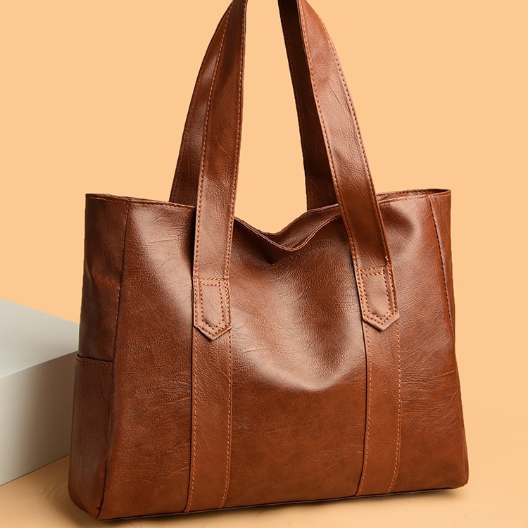 2024 European and American New Fashion Simple PU Soft Leather Trendy Handheld Tote Bag Large Capacity Shoulder Bag for Women_voghion.com