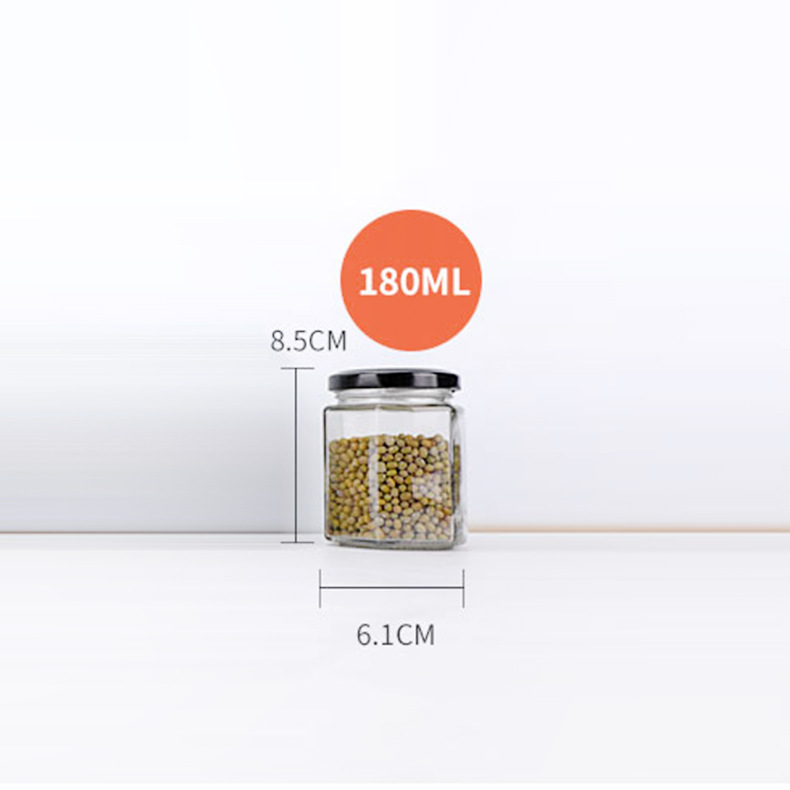Botella de vidrio hexagonal espesada botella de miel sellada con tapa de crema de limón enlatado de salsa de Chile botella fábrica al por mayor
