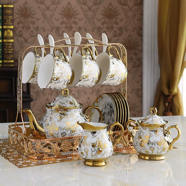 ==@ 16 pieces of golden flower bone china earthy + plain bag