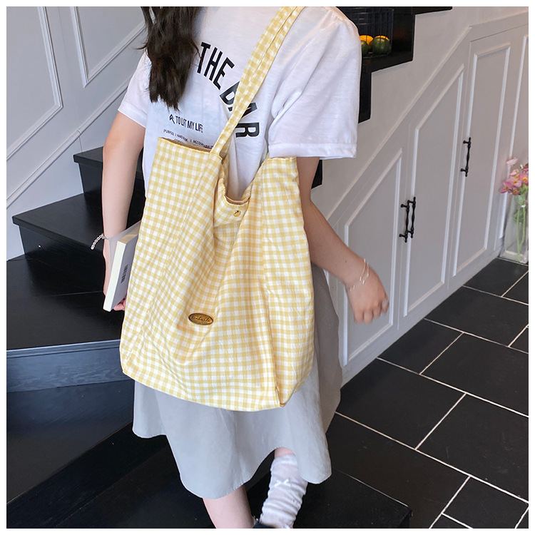 ins Korean-style laid-back single-shoulder bag, casual large-capacity black and white checkered tote bag, student commuting backpack for classes undefined