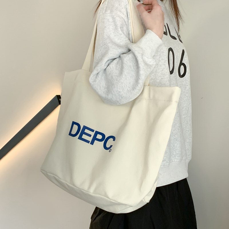 Cross-Border Hat Peak Explosion Japanese and Korean New Letter Apc Thick Canvas Bag Single Shoulder Handheld Shopping Bag Tote Bag Zipper Bag
