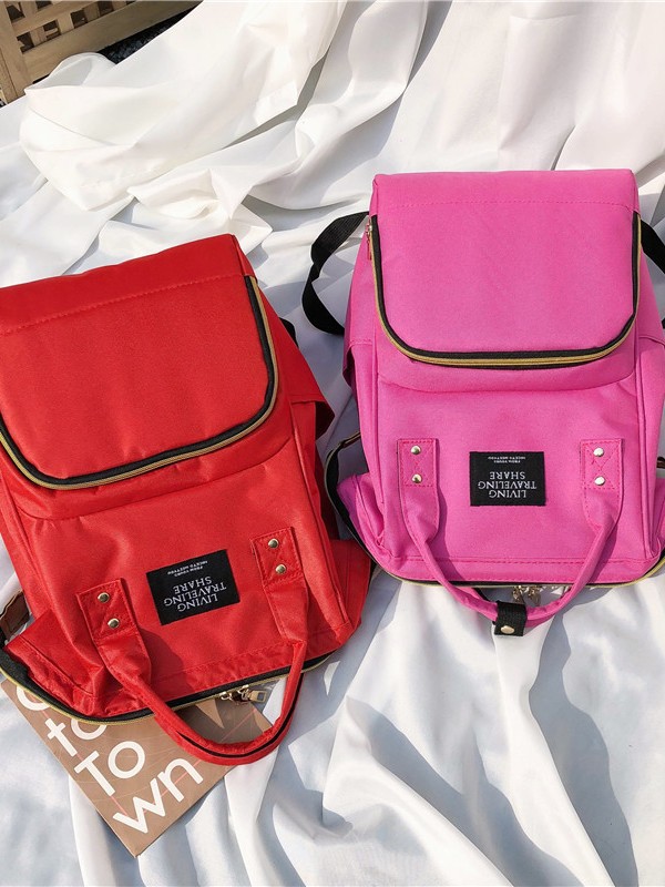 Estilo de gato transfronterizo de buena calidad, bolso de mamá de gran tamaño, mochila portátil, gran cantidad de stock, cremallera Oxford