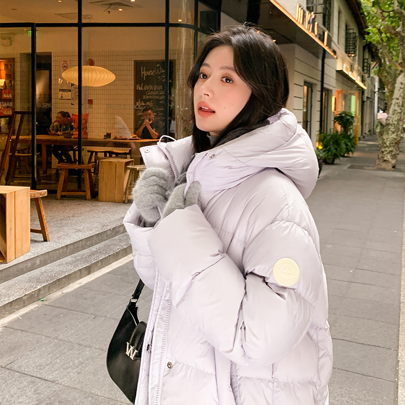 Capa de algodón de plumón corta para mujeres 2025 invierno nuevo suelto delgado vestido de pan puff grueso chaqueta de algodón con capuz