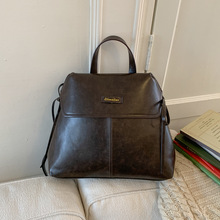 韩版复古蜡油皮双肩包女士休闲旅行背包2025新款学院风学生书包