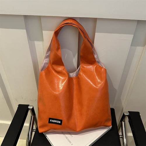 Korean-style large-capacity casual shoulder bag, niche hand-held tote bag, fashionable soft face commuting bag for women