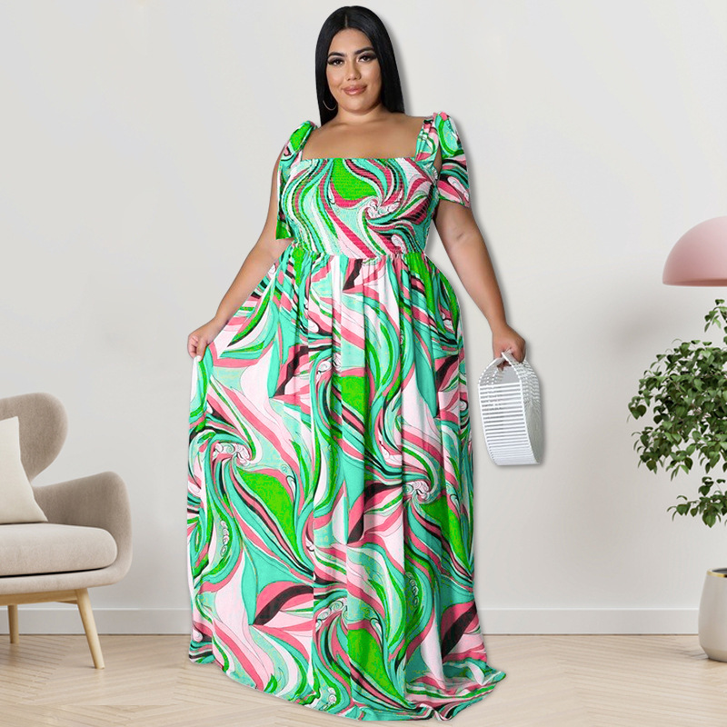Maxi jurk met spaghettibandjes en smockwerk en strikprint_voghion.com