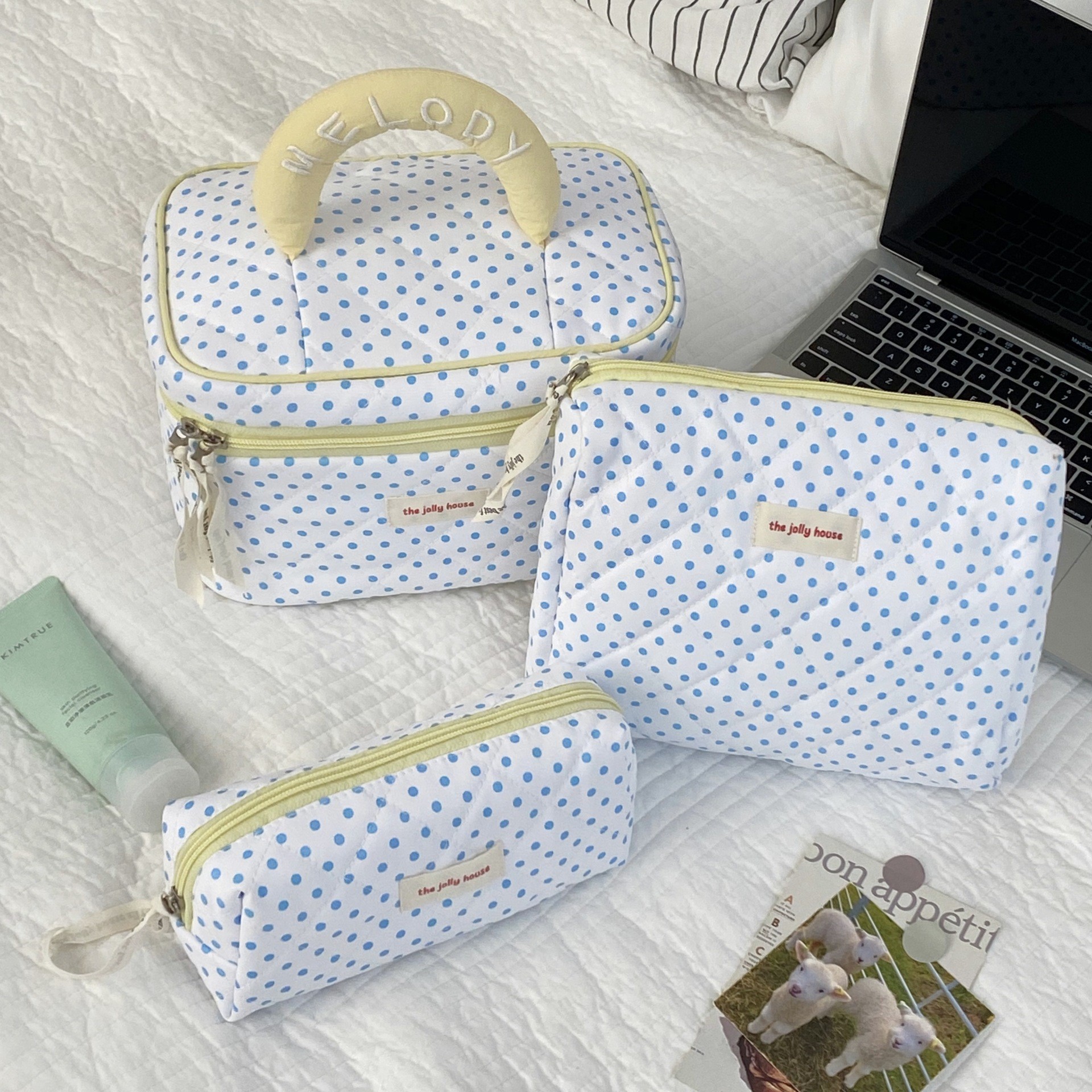 Versión coreana de la bolsa de cosméticos con lazo simple, bolsa de lavado de viaje portátil de gran capacidad, bolsa de almacenamiento de cosméticos para niñas