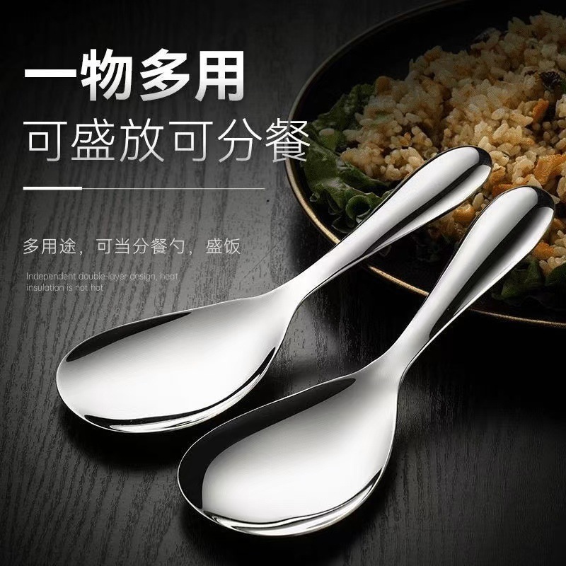 ステンレスの大きいしゃもじの調理器具のご飯の鍋のスプーンはお粥のスプーンを入れます。|undefined