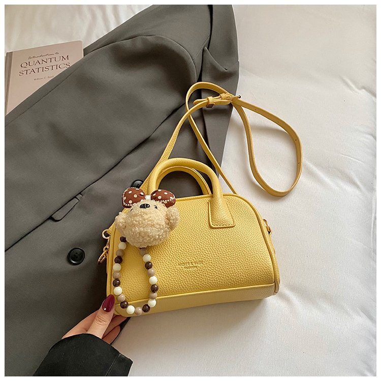 Bolsa de brazo retro nicho para mujeres 2026 nueva moda coreana bolsa de bolos portátil de gran capacidad bolso de hombro