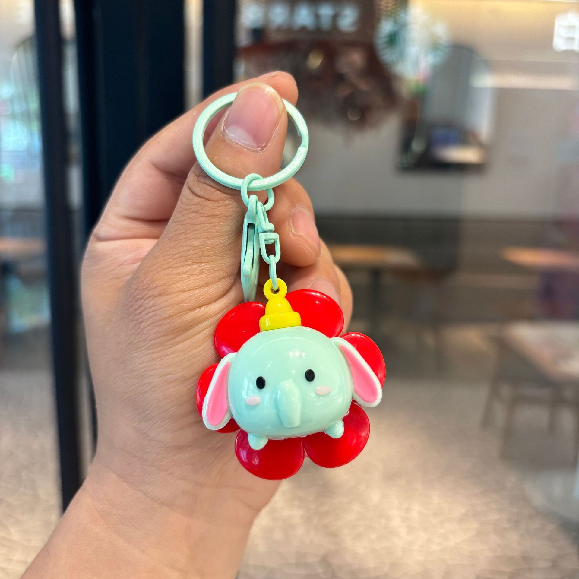 Llavero de girasol-elefante bebé