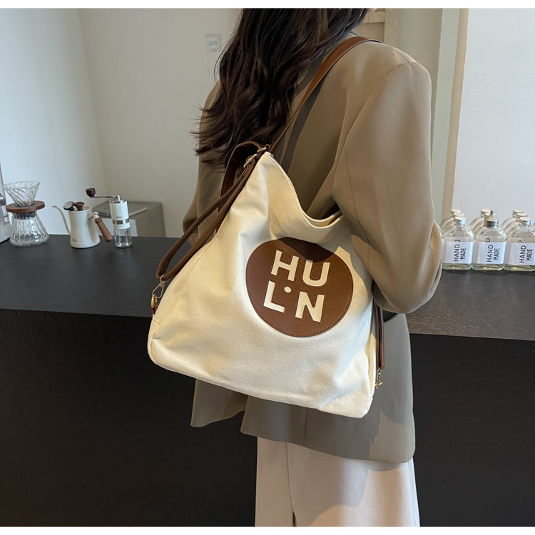 Korean letter printed multi-purpose cloth bag, 2024 new style, high-quality student backpack, commuting single-shoulder bag undefined