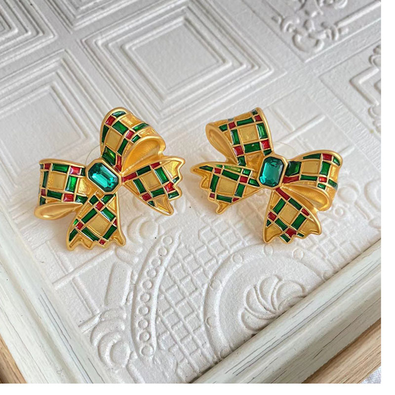 Simple Style Bow Knot Alloy Inlay Artificial Gemstones Womenu0027S Ear Studs 1 Pair