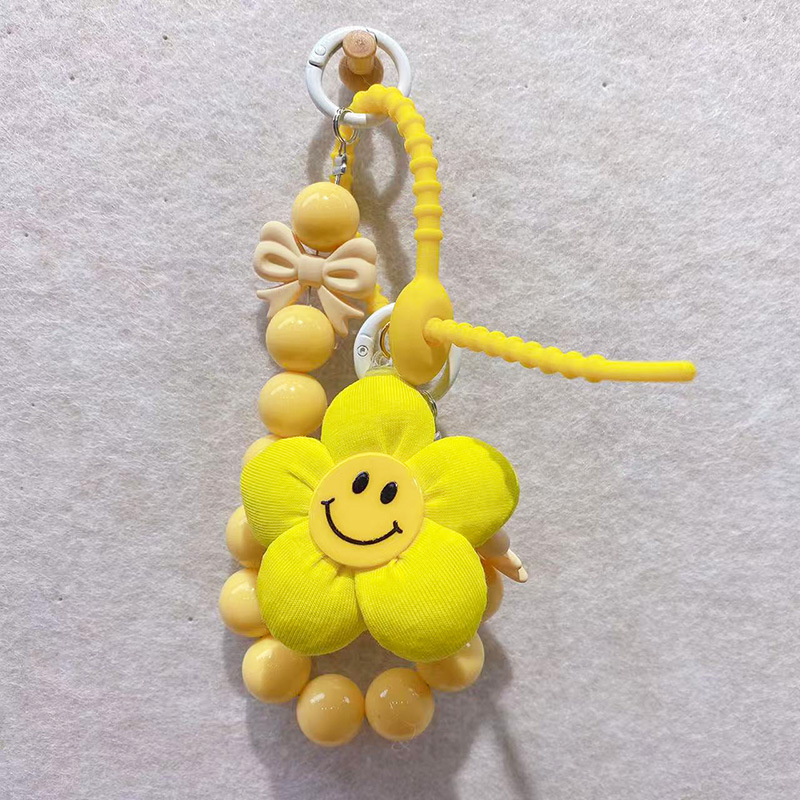 HD4476A05 Coreano. Cara sonriente tela flor con cuentas llavero de silicona personalizada dulce red estilo rojo colgante adornos