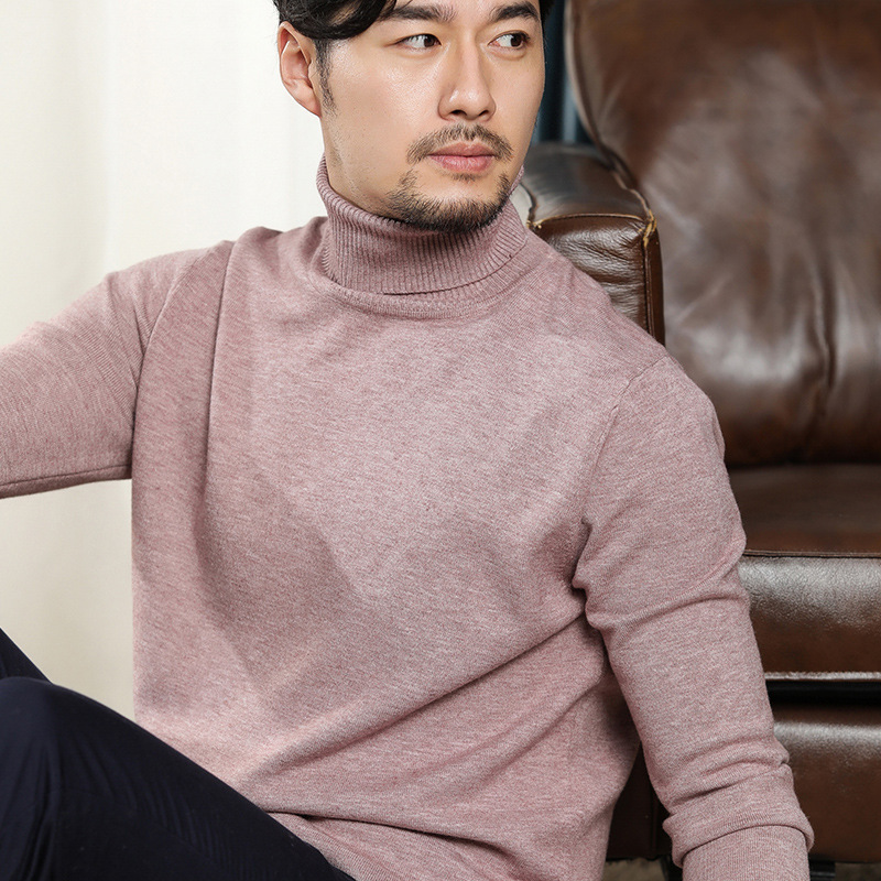 秋冬の新型男性韓国版高襟のニットの純色のビジネス男性は大きいサイズのゆったりしたセーターを打ちます。